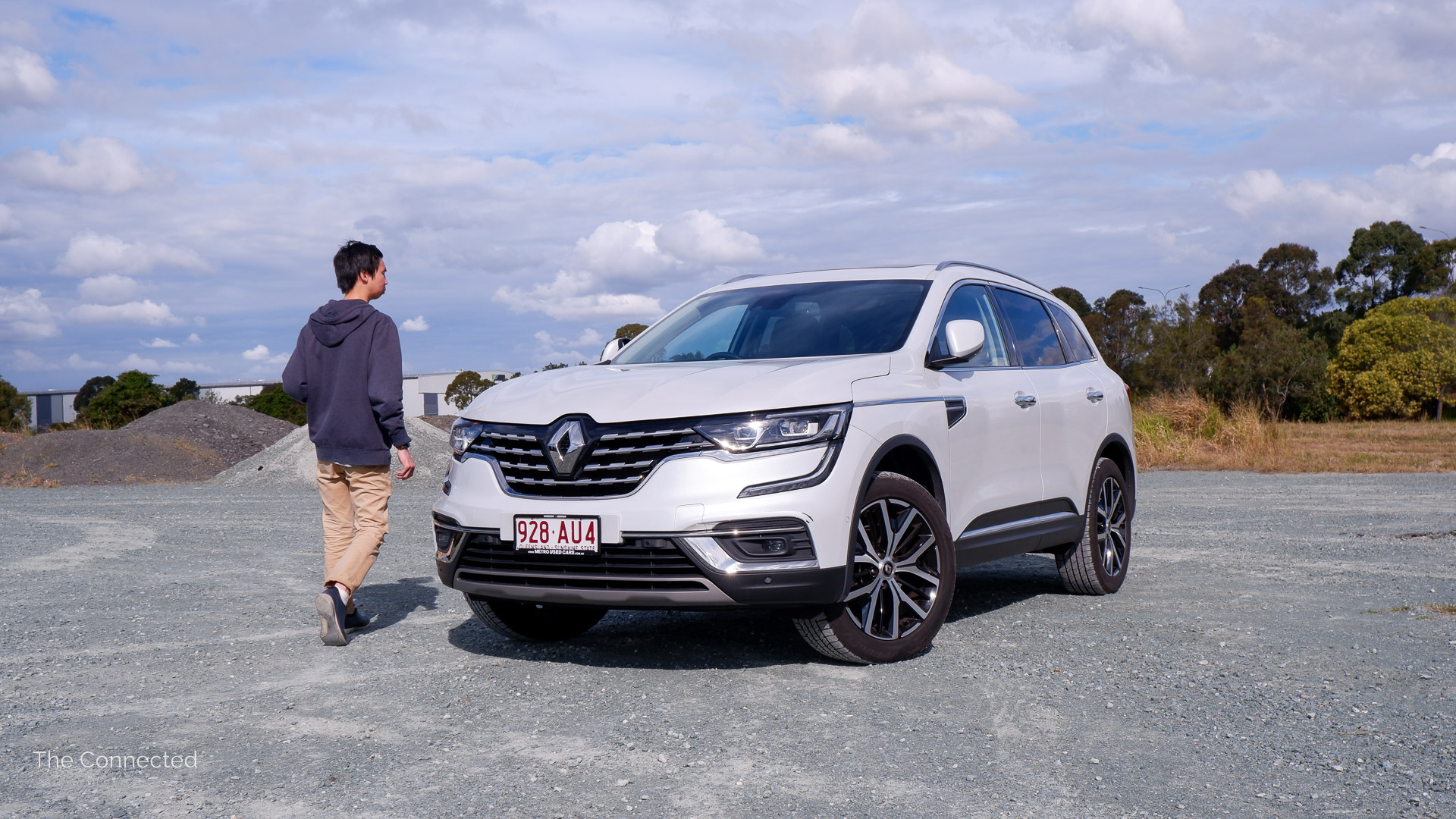 Man walks towards Renault Koleos