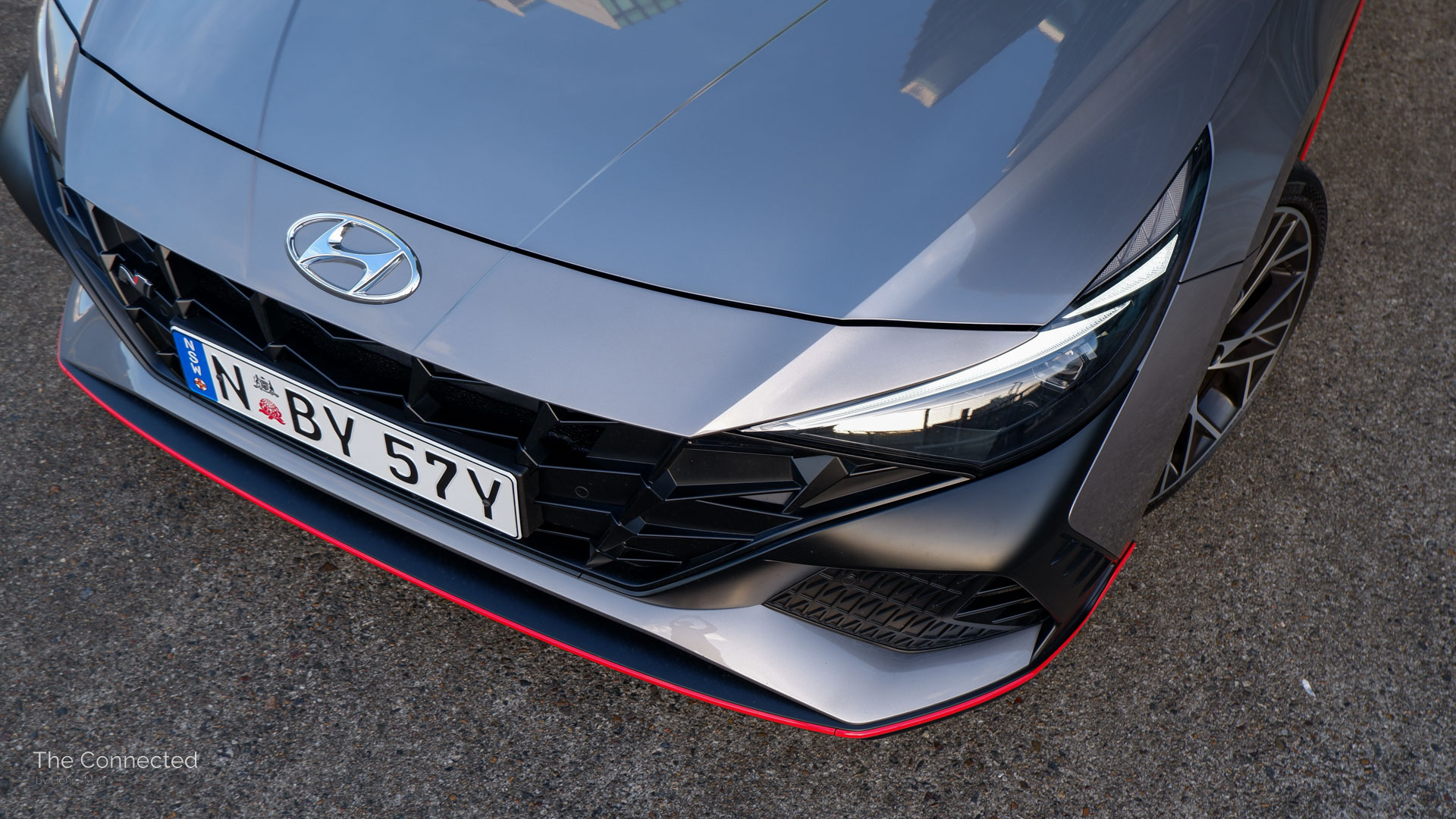 Hyundai i30 Sedan N grille and headlights front-quarter top-down view