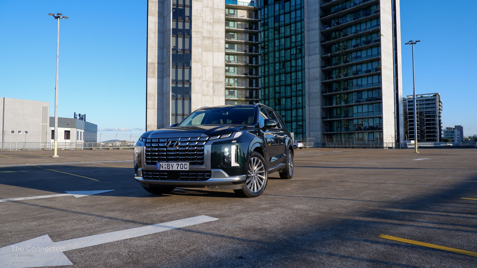 Hyundai Palisade diesel at rooftop car park in front of apartment