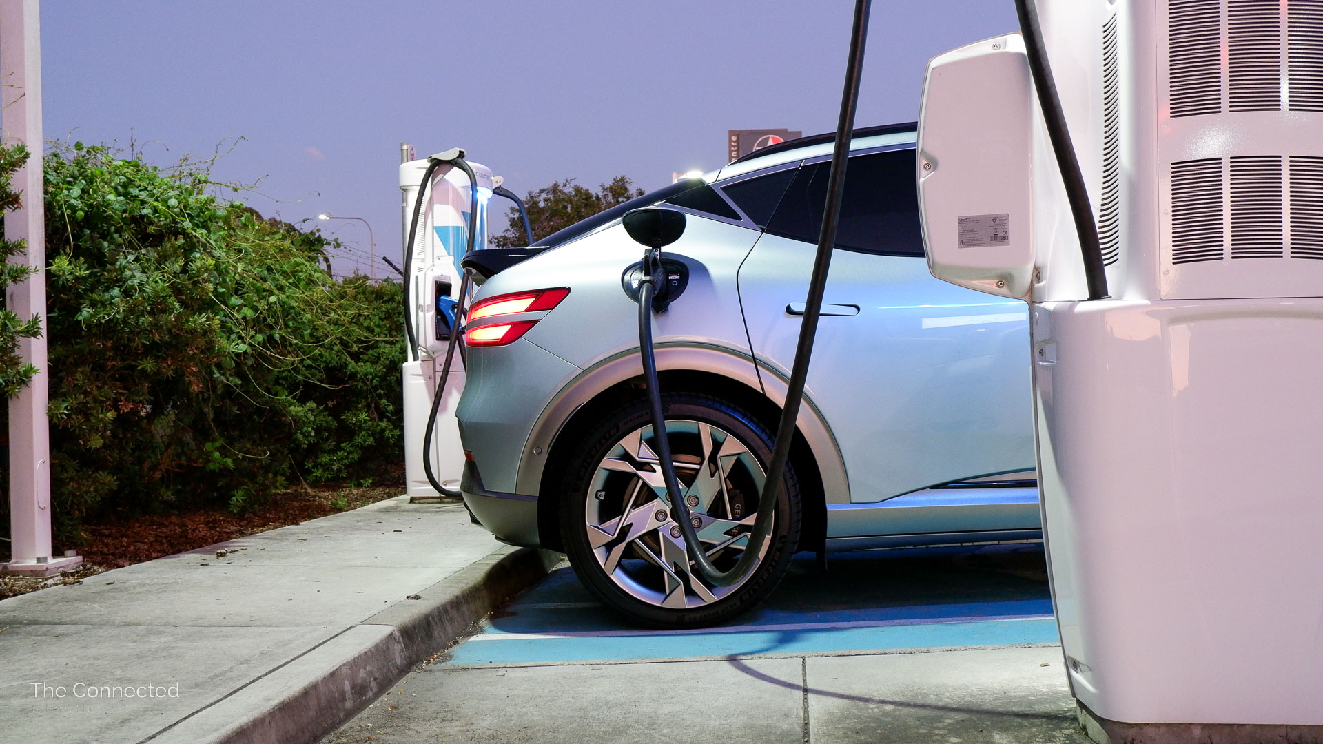 Genesis GV60 charging at public ultra-fast charging station