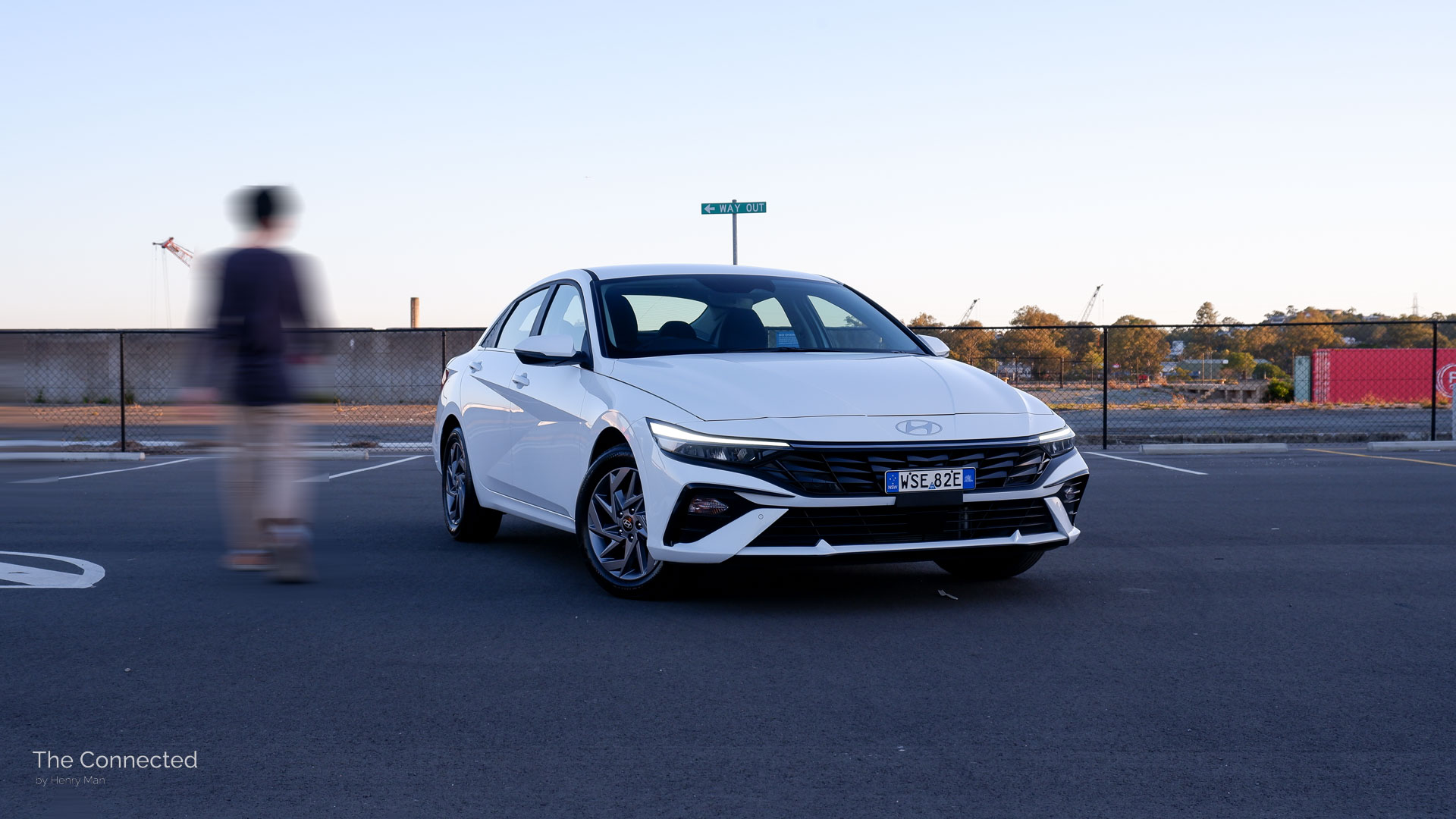 Man walks past 2025 Hyundai i30 Sedan