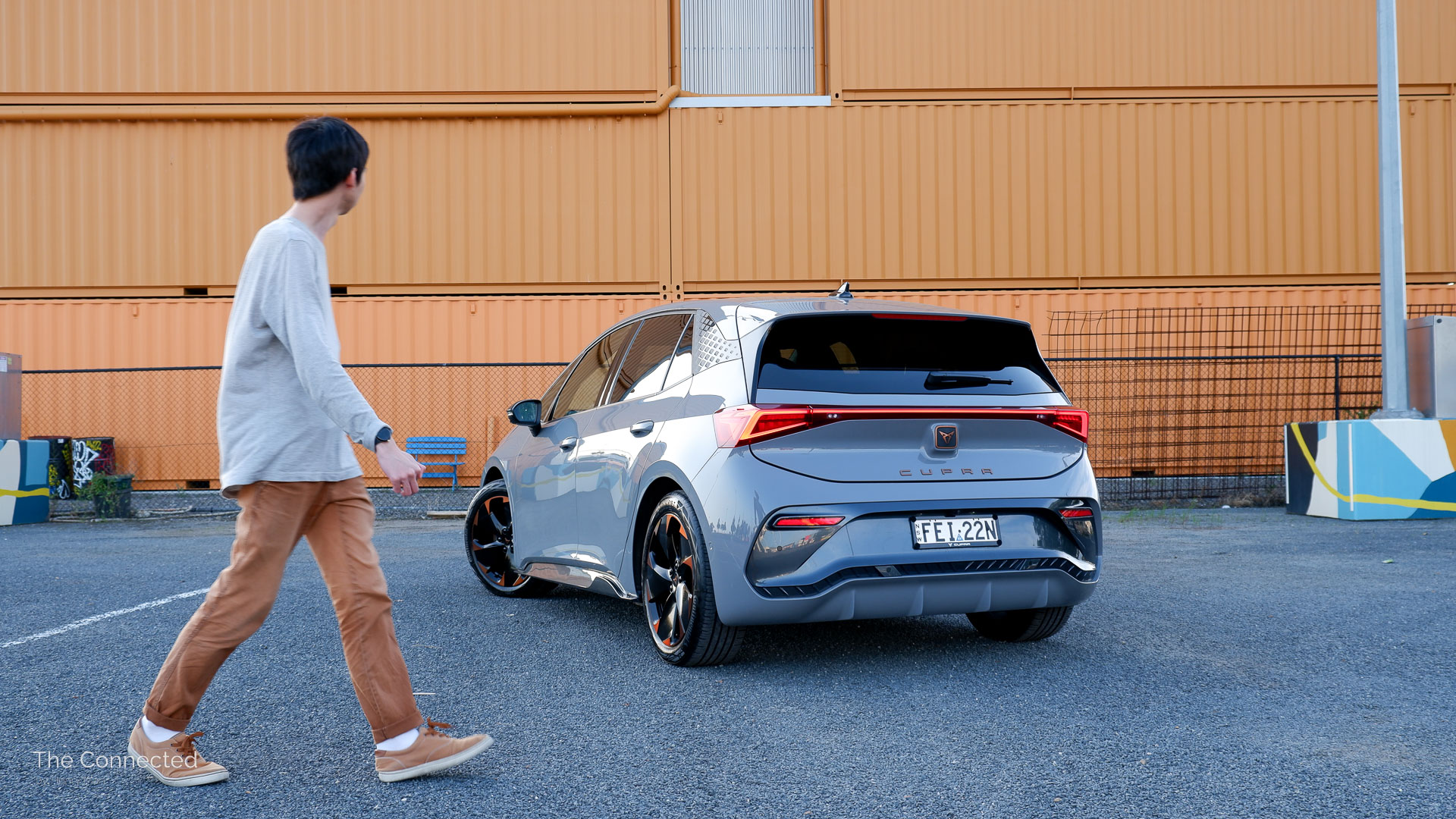 Man walks past 2024 Cupra Born