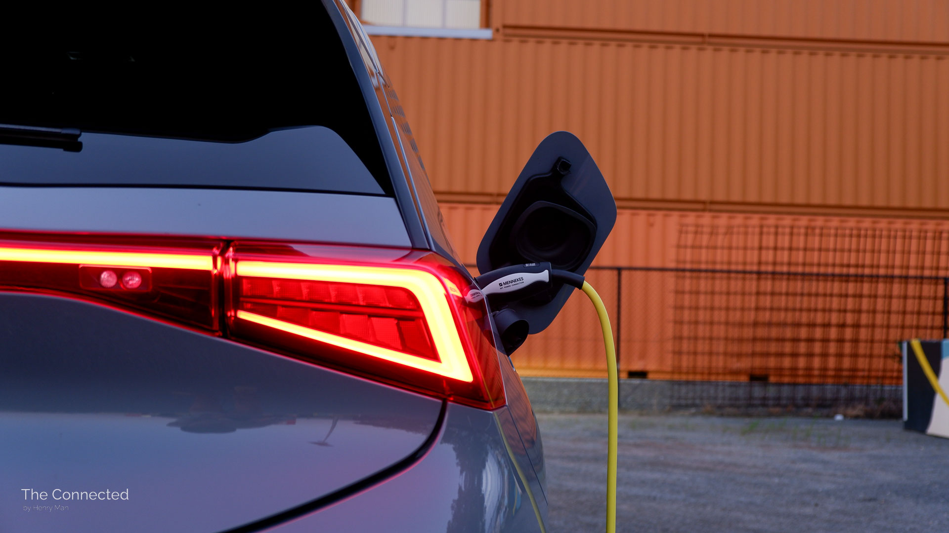 Yellow charging cable plugged in 2024 Cupra Born