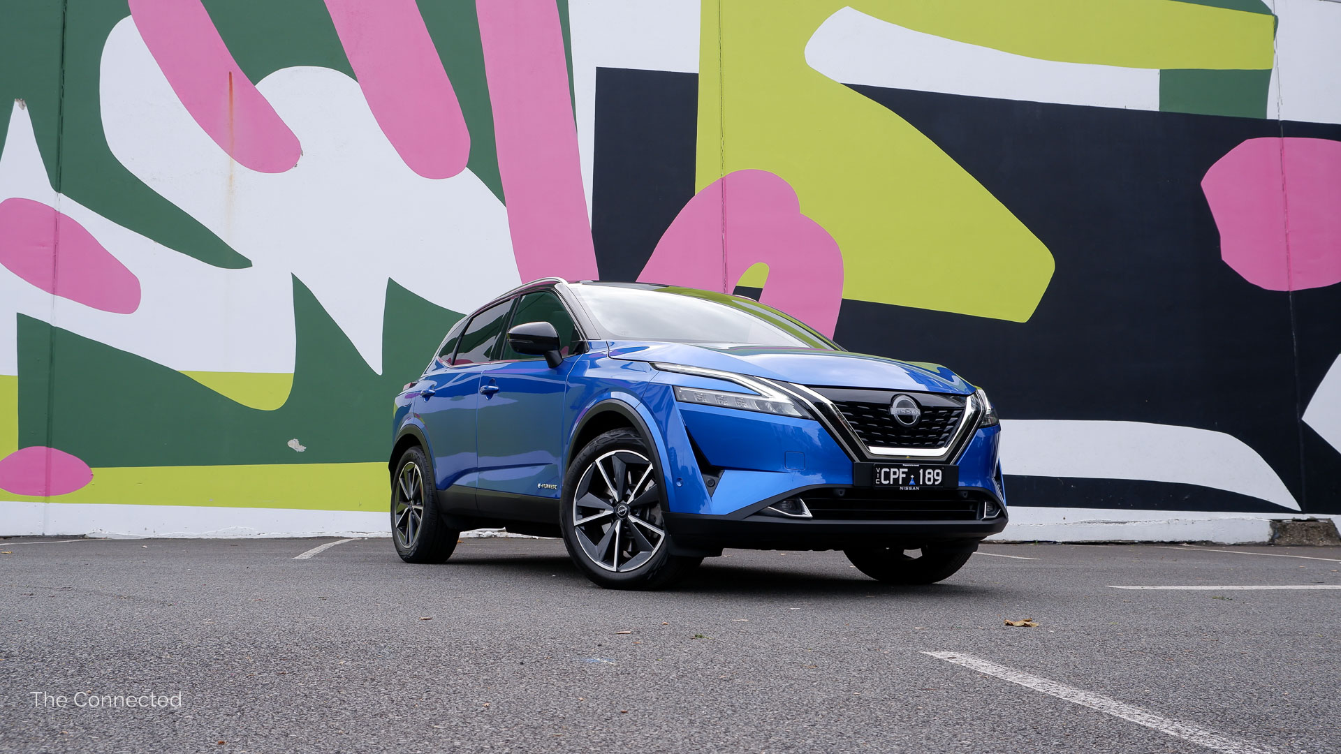 Nissan Qashqai e-Power in front of painted wall