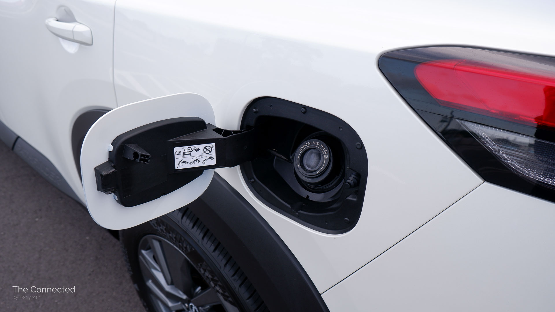 2025 Nissan Pathfinder ST-L open fuel lid