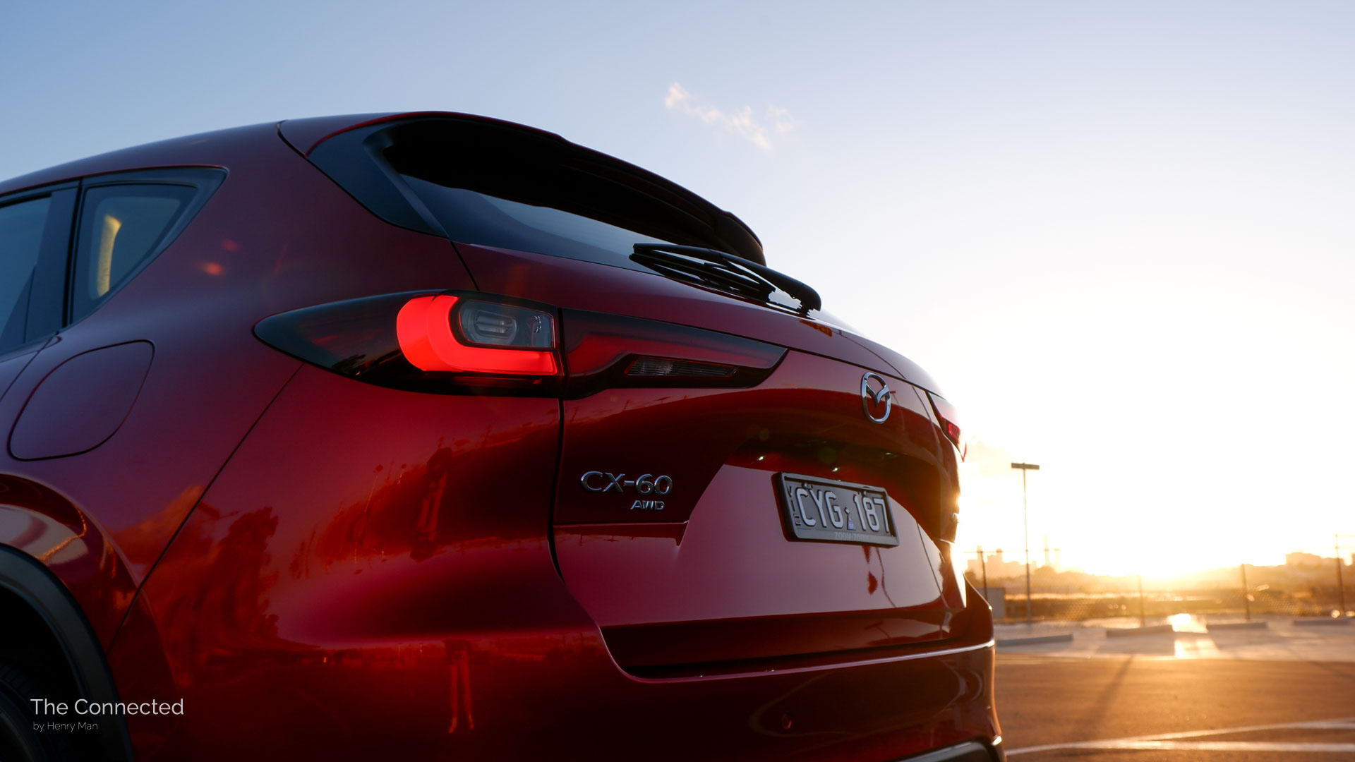 2024 Mazda CX-60 Evolve tailgate in front of sunset