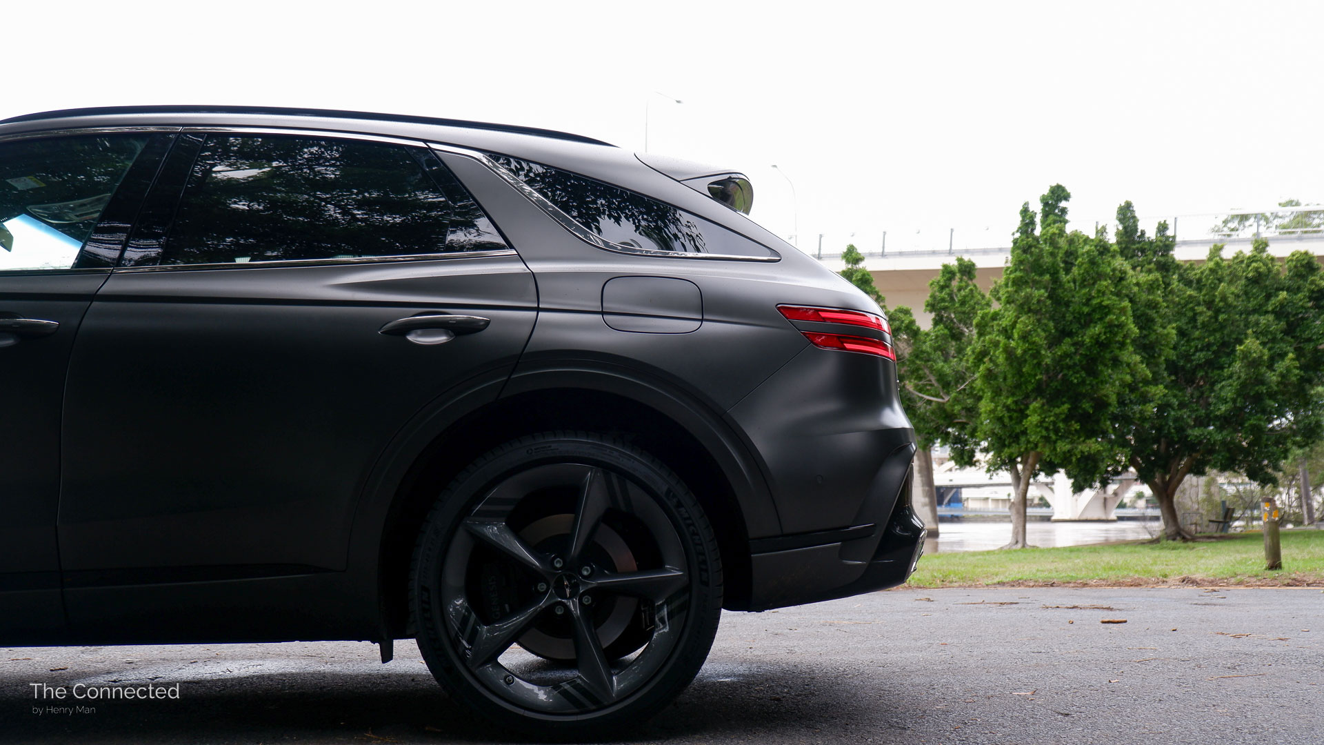 2025 Genesis GV70 Signature Sport rear C-pillar side view