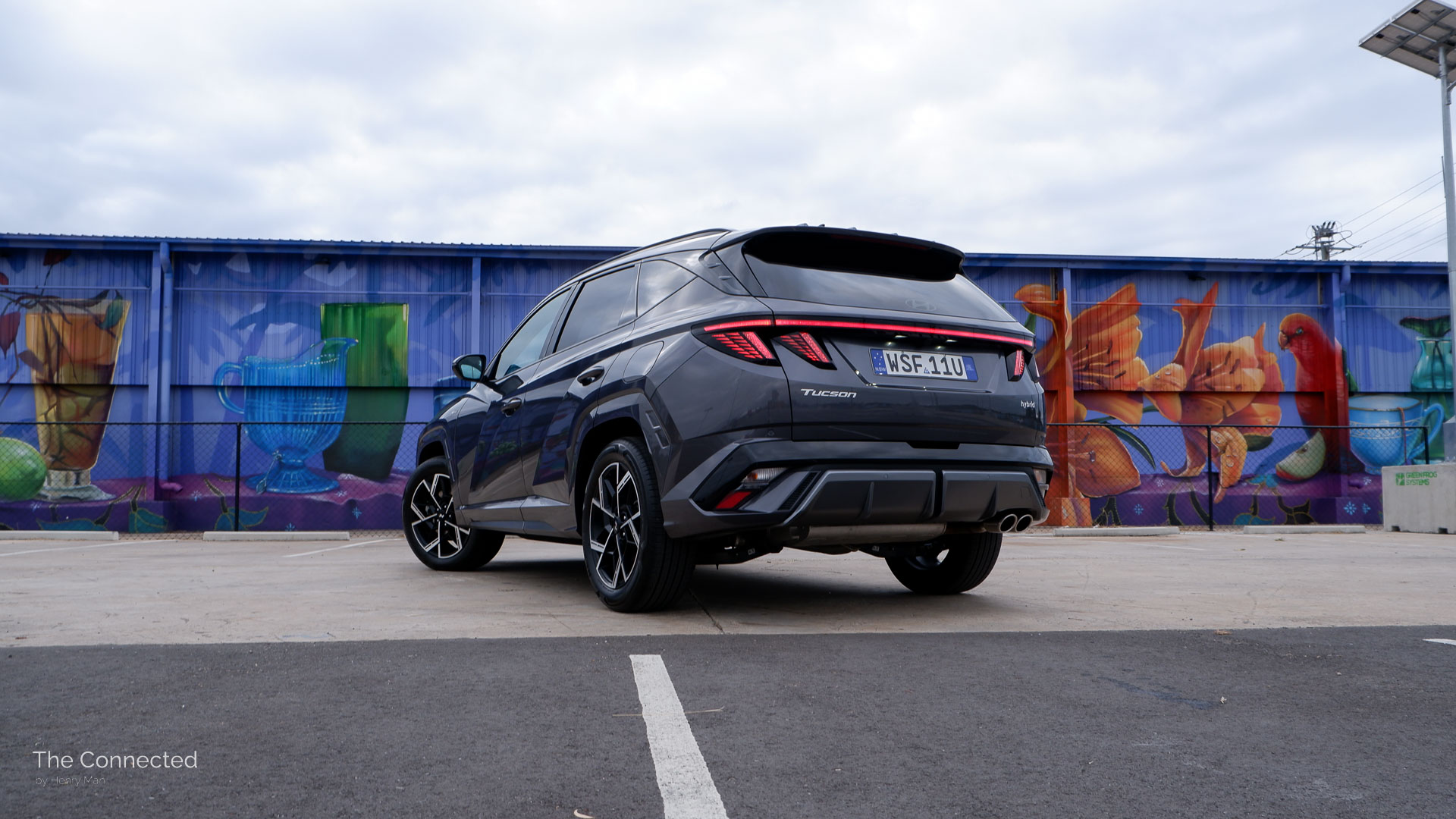 2025 Hyundai Tucson Hybrid Elite N Line rear-quarter view