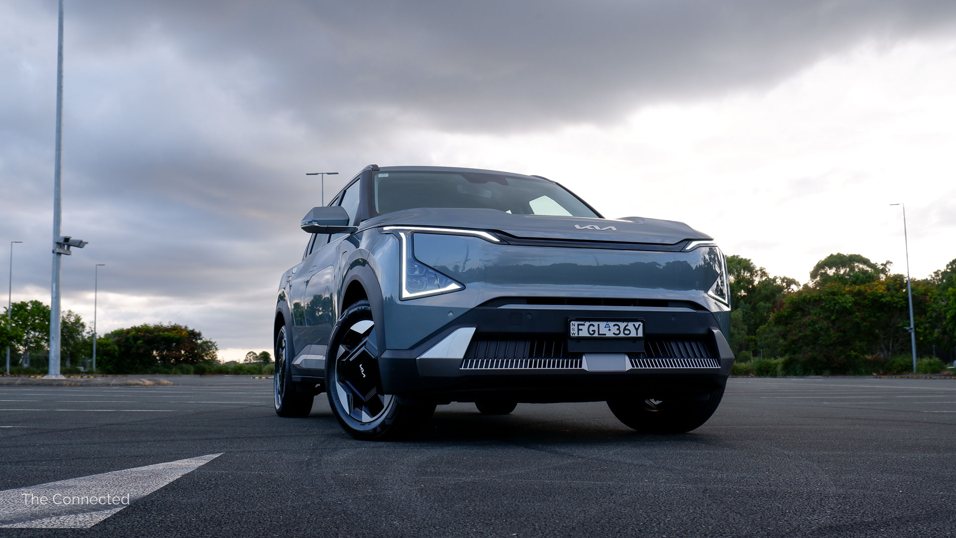 2025 Kia EV5 Air front-quarter view with clouds behind