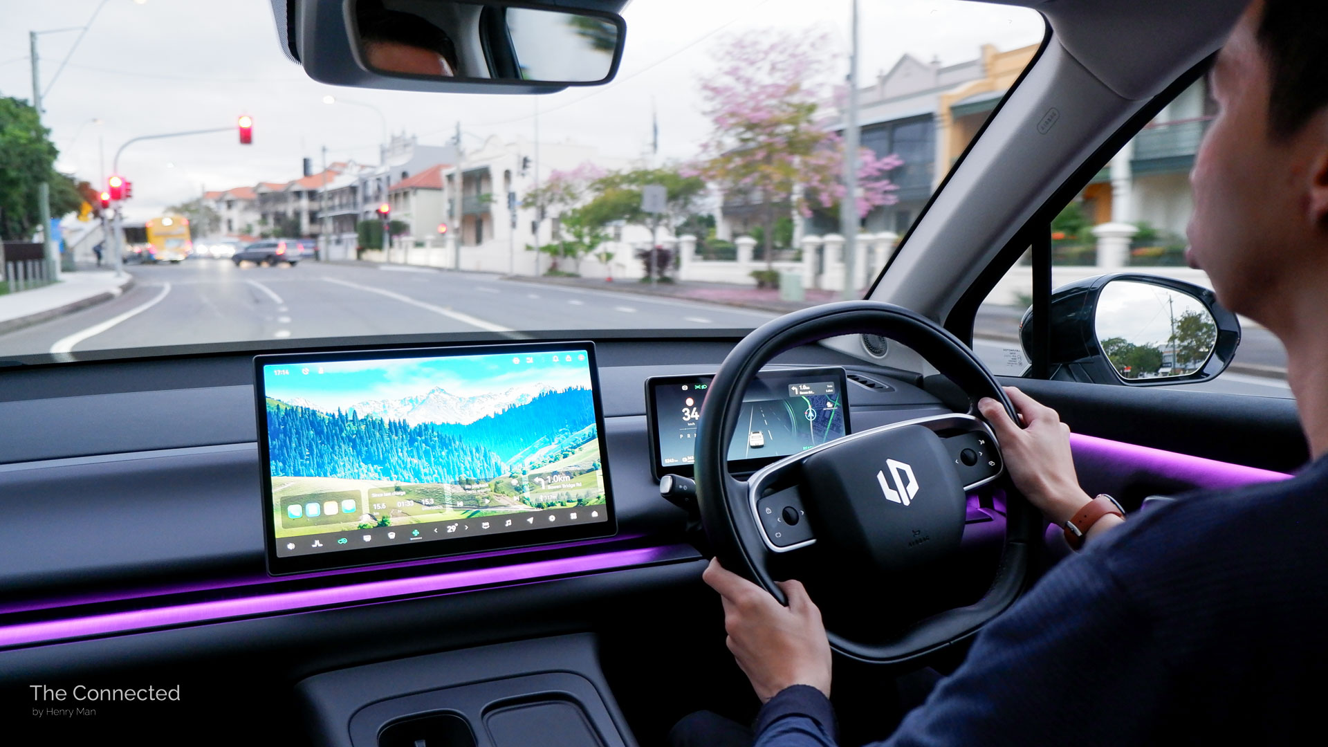 Man driving the 2025 Leapmotor C10 BEV through suburbs
