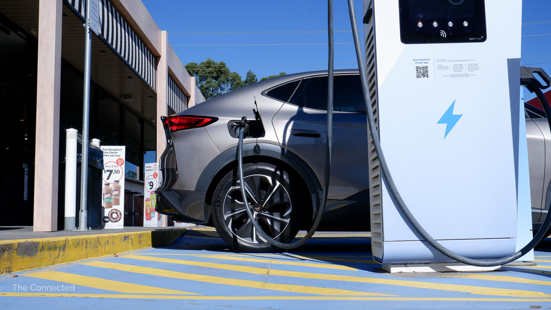 2026 Cupra Tavascan Endurance plugged in at public Ampol AmpCharge fast charging station