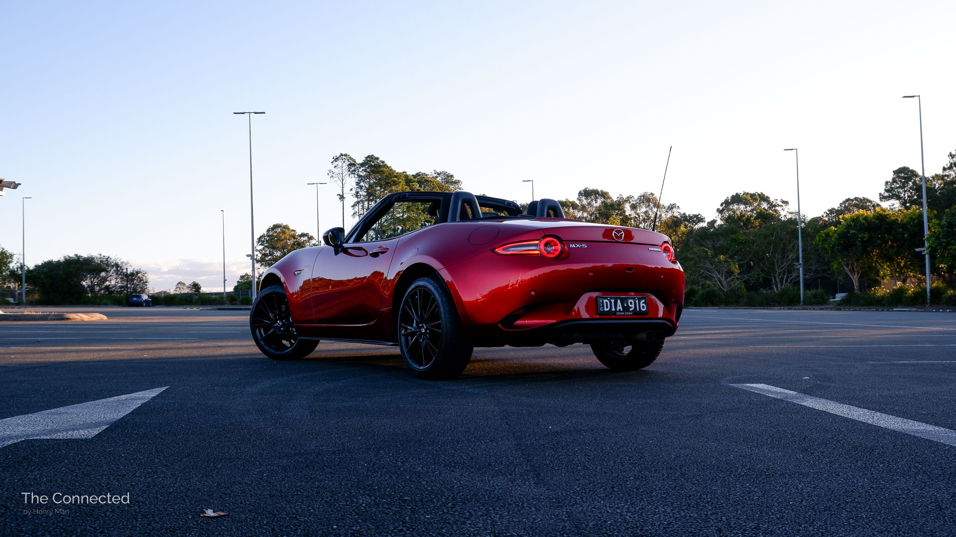 2026 Mazda MX-5 G20 Roadster rear-quarter view in sunset