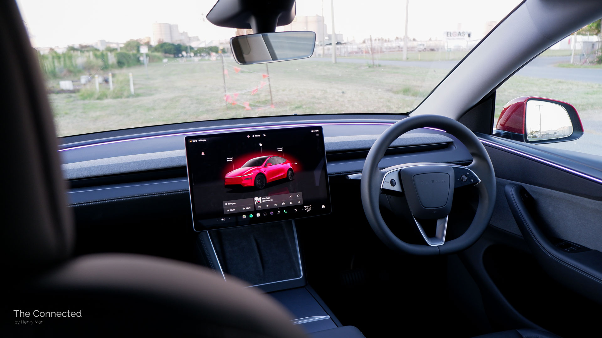 2026 Tesla Model Y RWD Ultra Red interior and dashboard