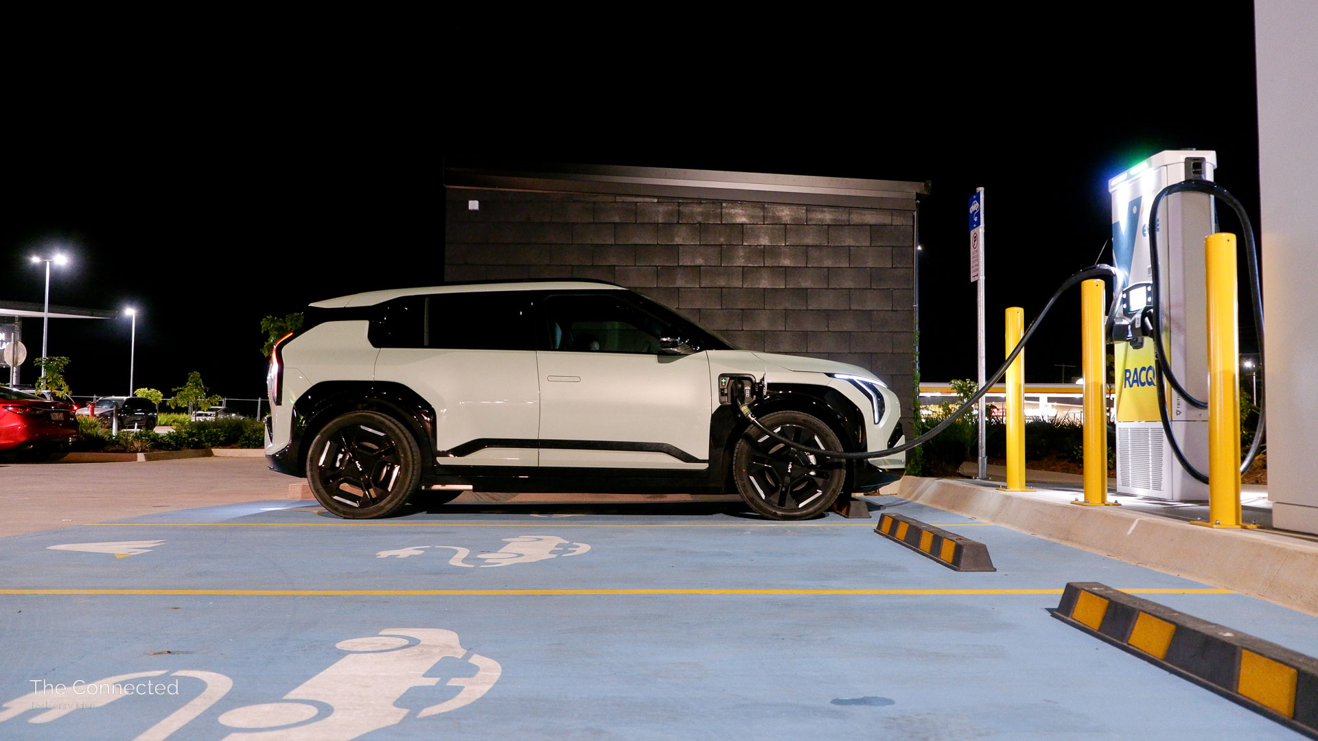 2026 Kia EV3 GT-Line charging at Evie fast charging station during the night