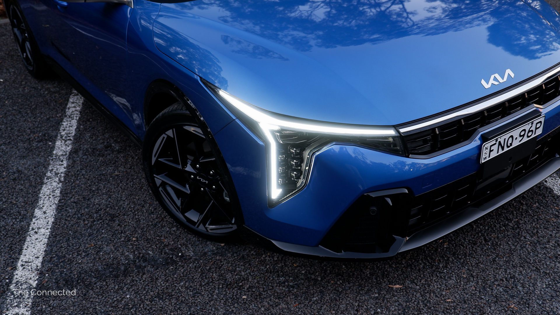 2026 Kia K4 Sedan GT-Line front LED daytime running light and bonnet