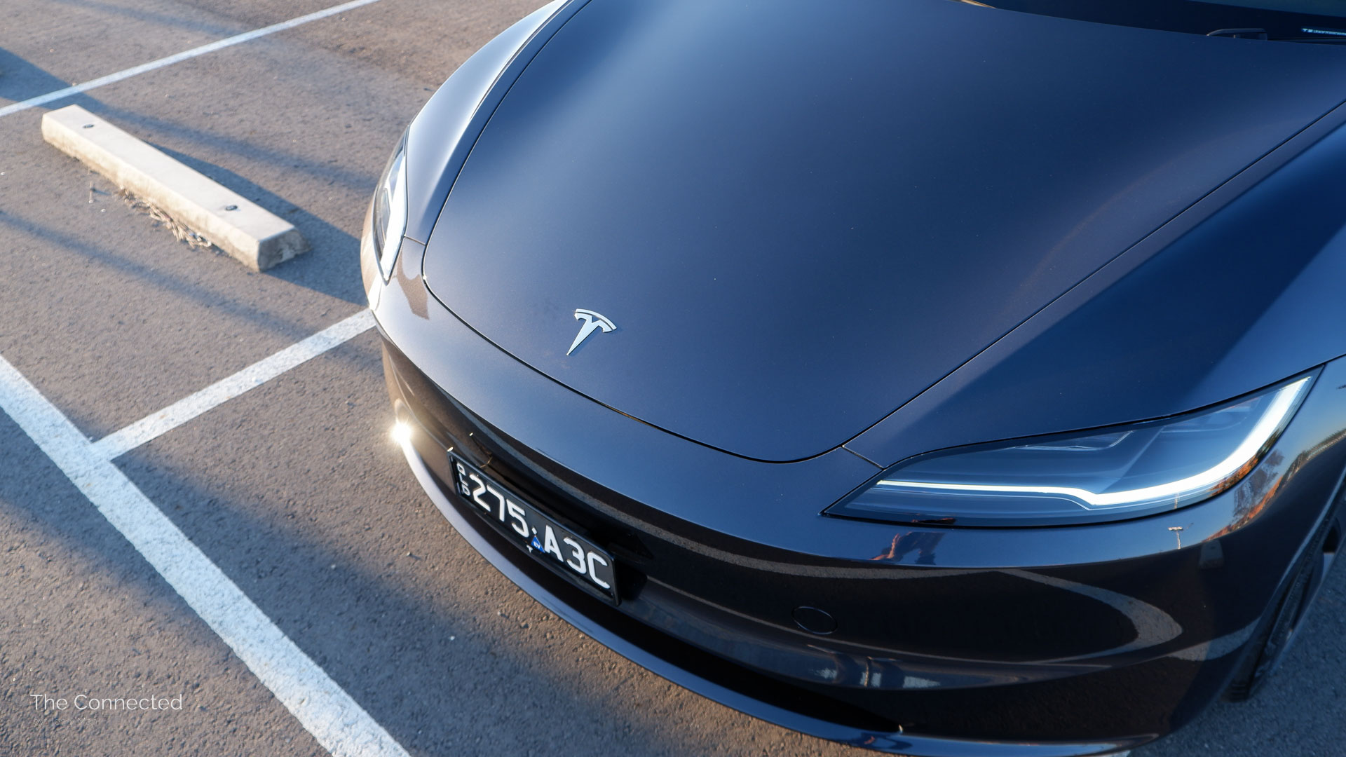 2025 Tesla Model 3 front headlights and bonnet with Tesla logo