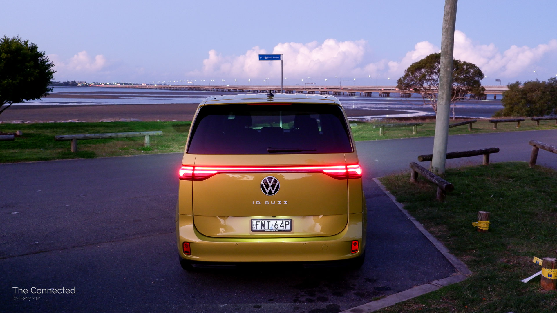 2026 Volkswagen ID.Buzz Pro SWB rear tailgate during the sunset with ocean and bridge in the background