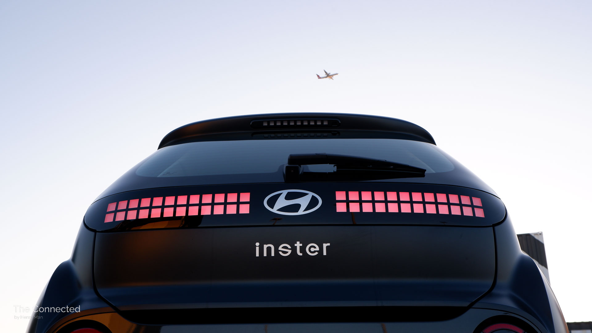 2026 Hyundai Inster Standard Range rear tail-light with aeroplane flying in the sky