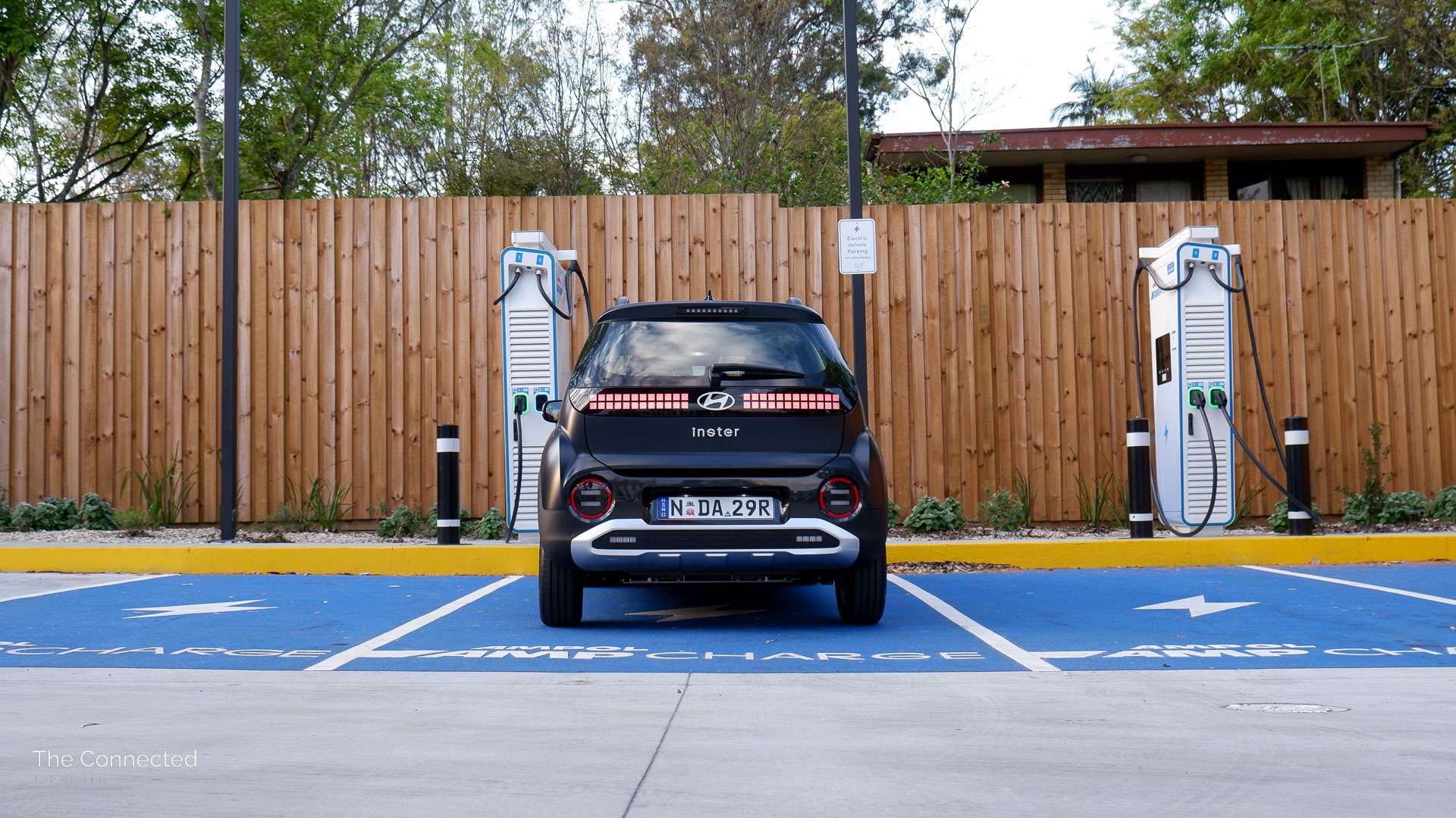 2026 Hyundai Inster Standard Range charging at Ampol AmpCharge station