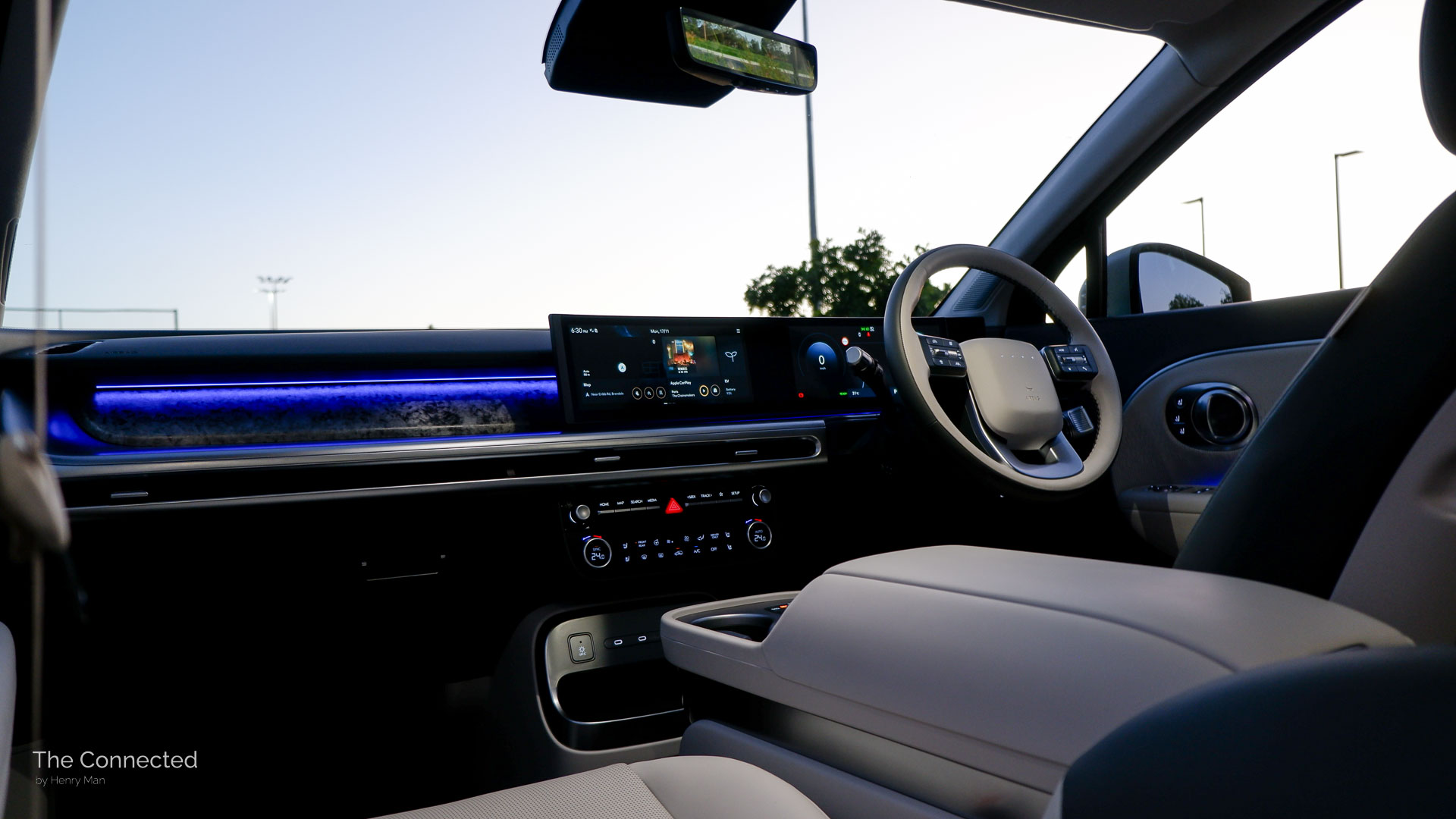 2026 Hyundai Ioniq 9 Calligraphy interior and dashboard in the evening with purple ambient lighting