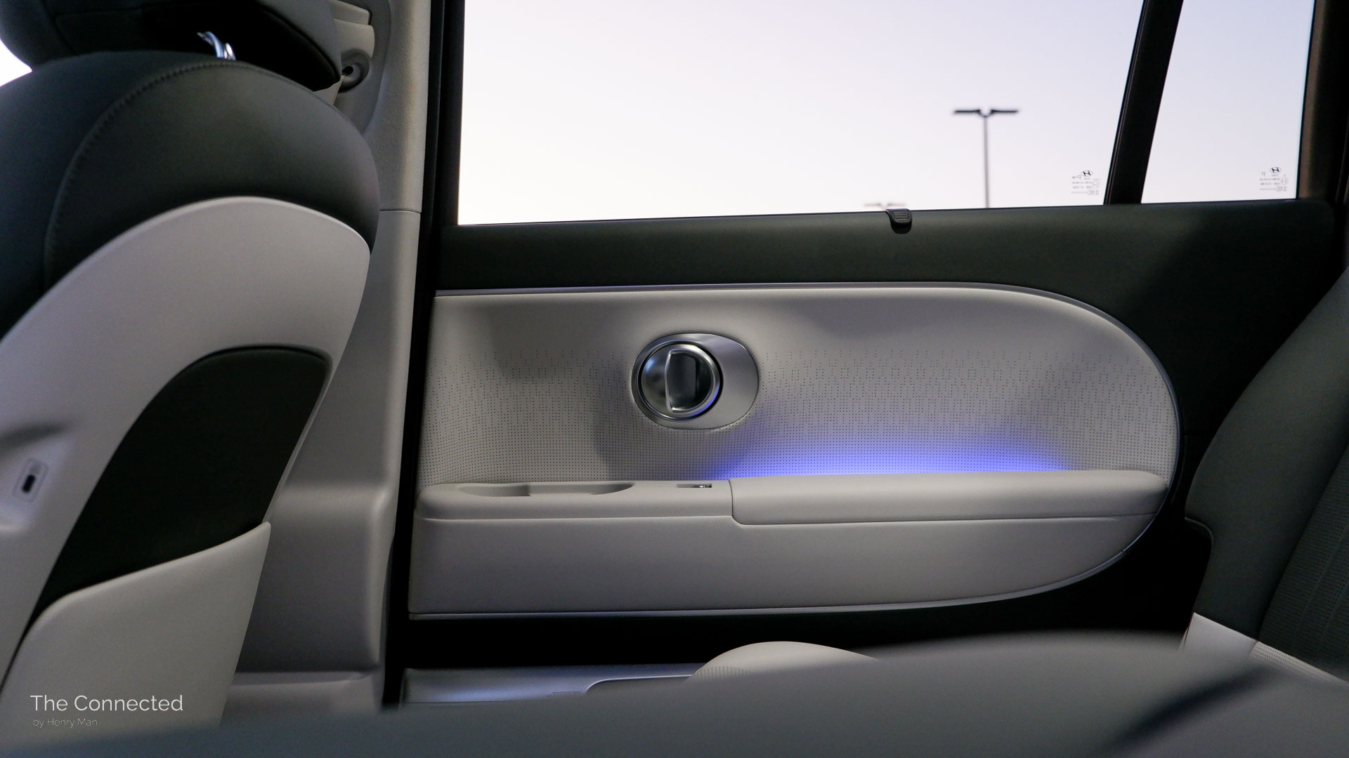 2026 Hyundai Ioniq 9 Calligraphy rear door with oblong shape and purple ambient lighting