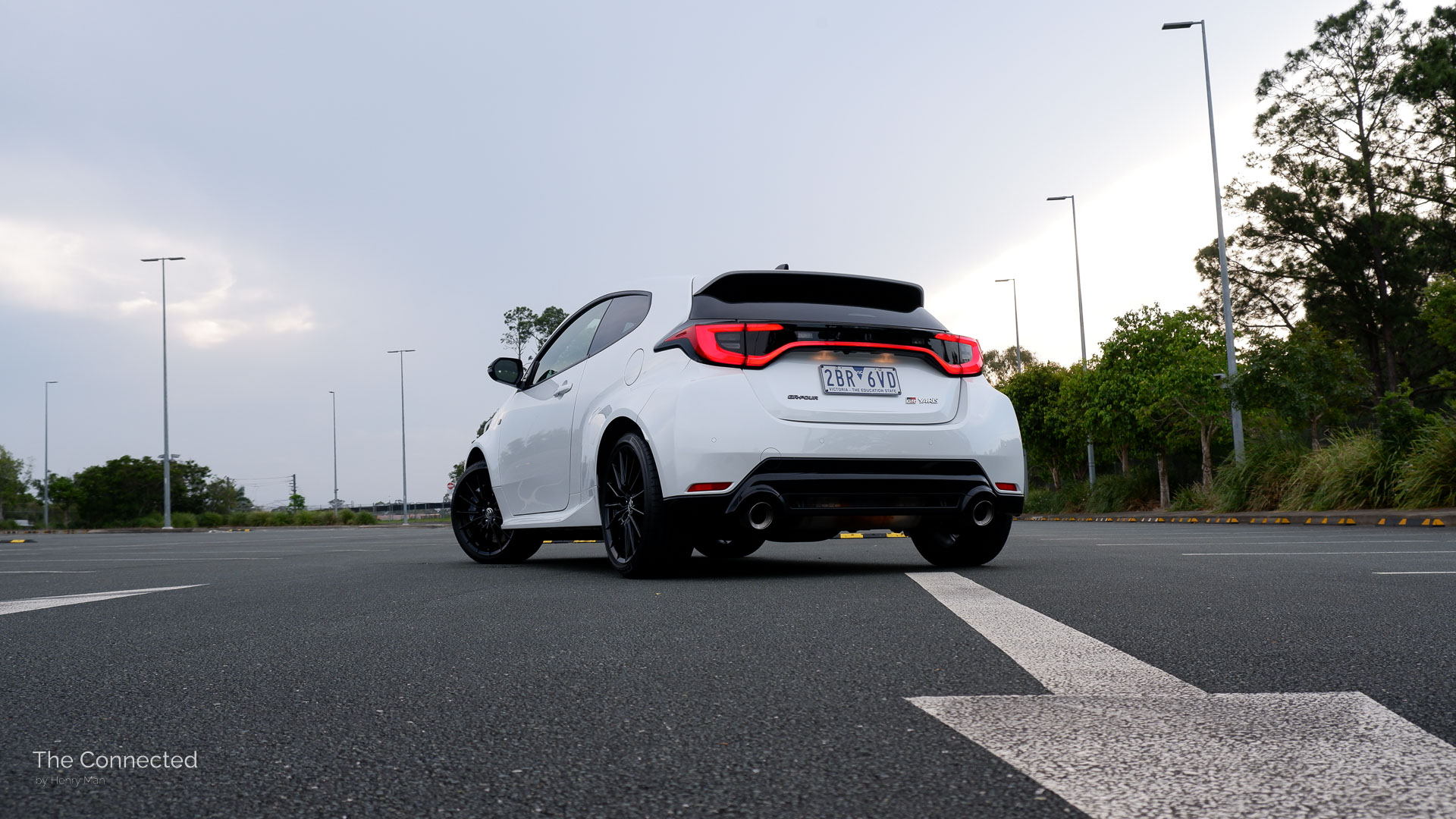 2026 Toyota GR Yaris GT rear-quarter view in car park with painted arrow on the ground