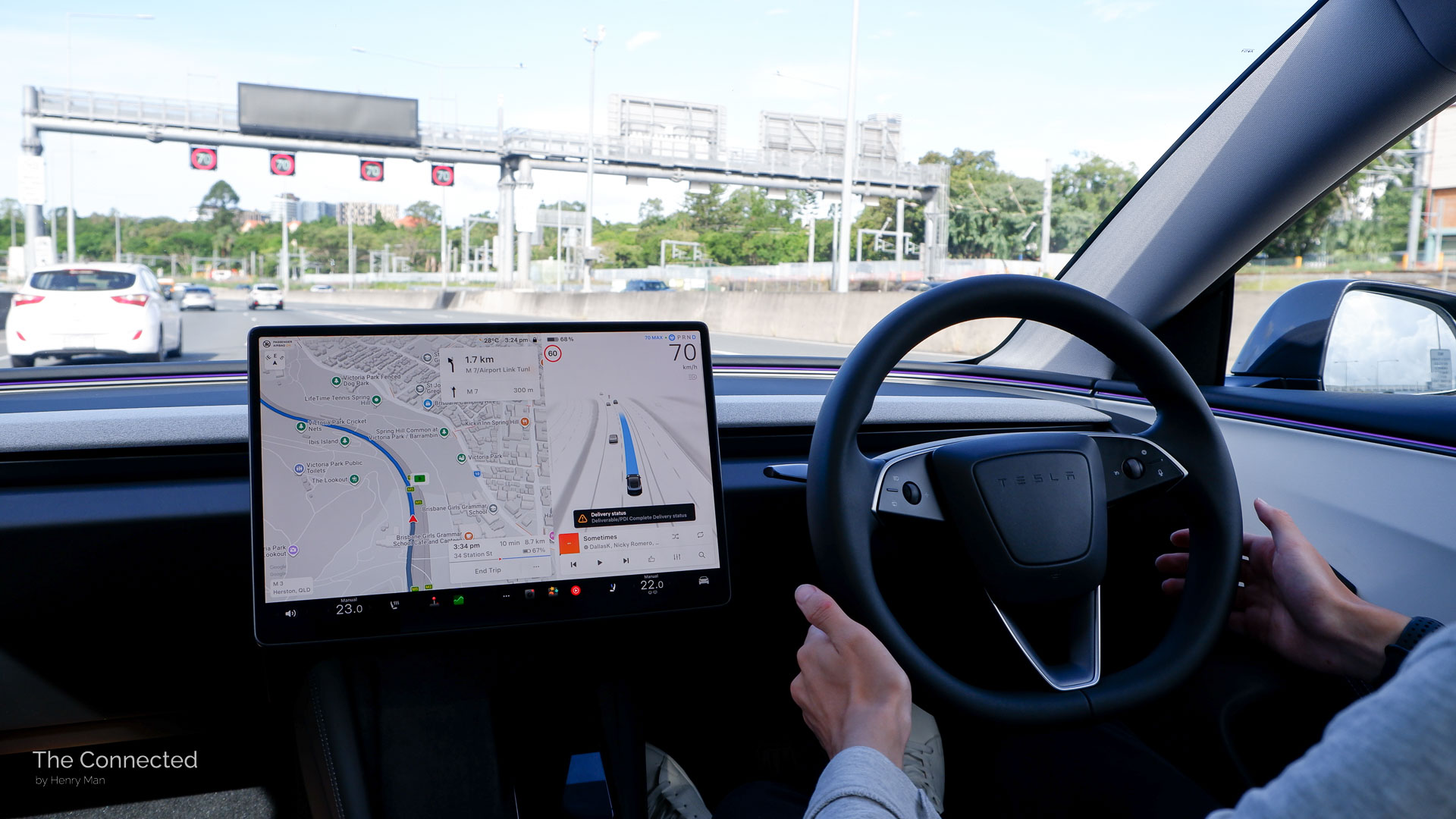 Man driving the 2026 Tesla Model 3 Premium Long Range RWD with FSD (Supervised) on approaching digital speed signs