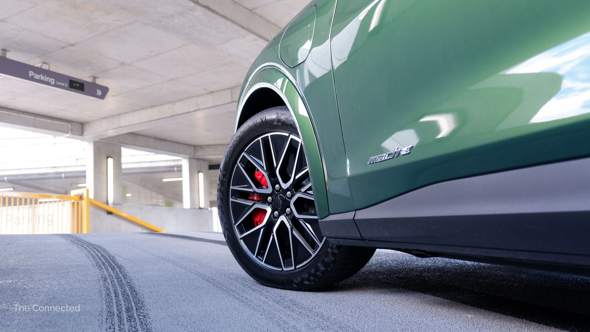 2026 Ford Mustang Mach-E Premium front alloy wheel with red-painted Brembo brake