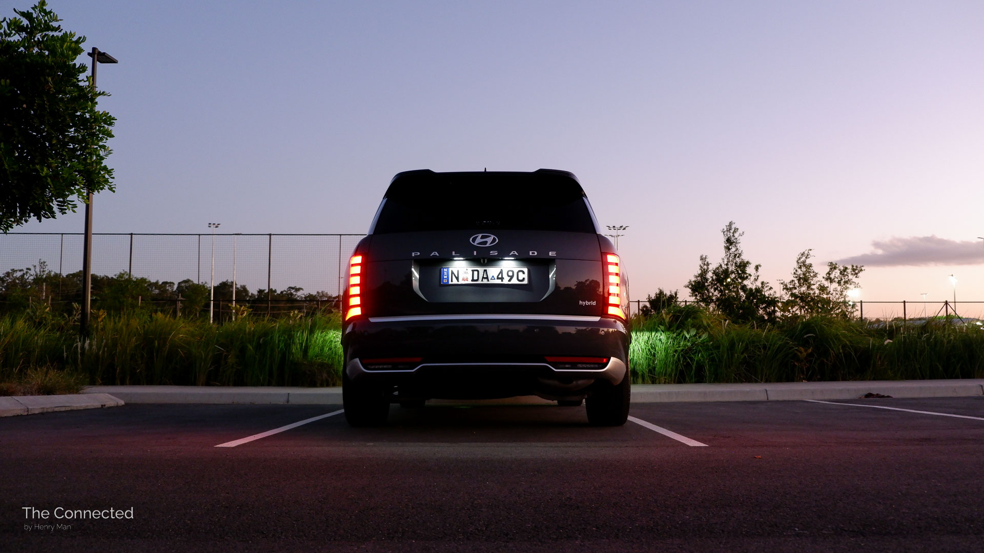 2026 Hyundai Palisade Calligraphy Hybrid rear in the sunset