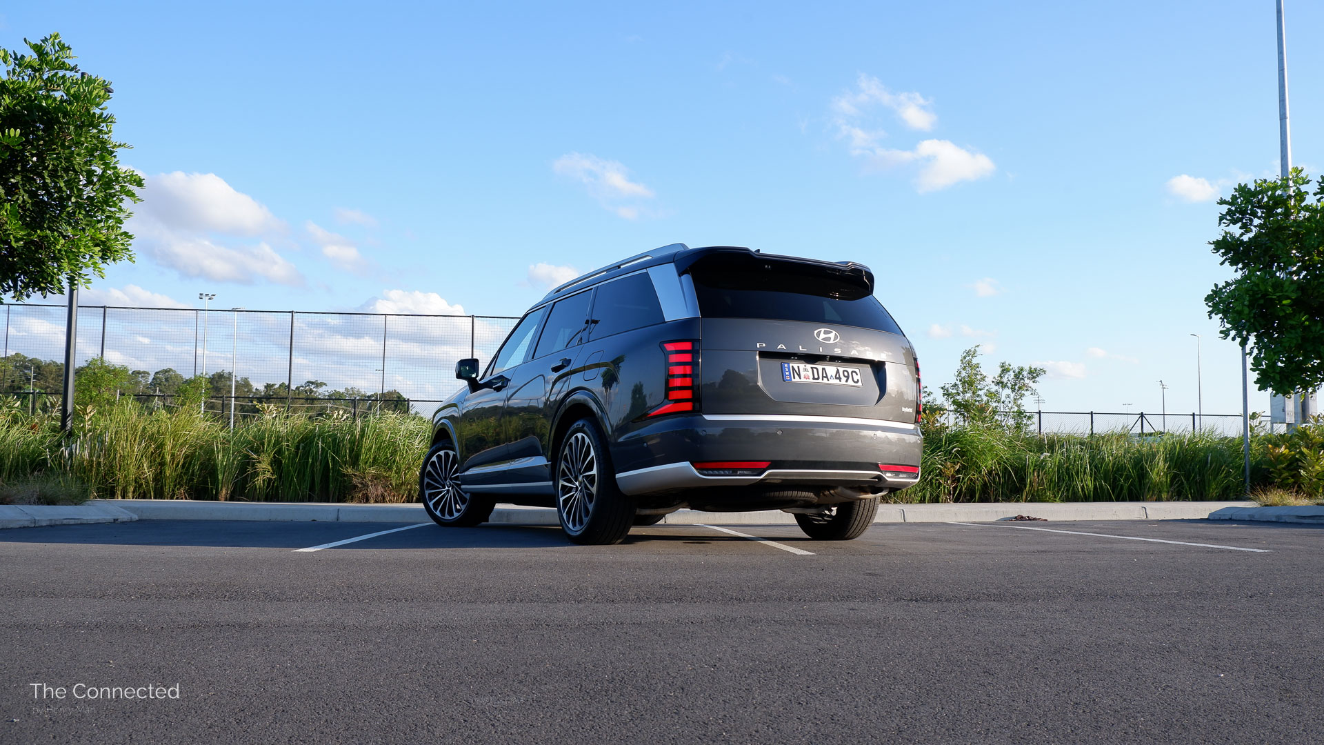 2026 Hyundai Palisade Calligraphy Hybrid rear-quarter view at park car park