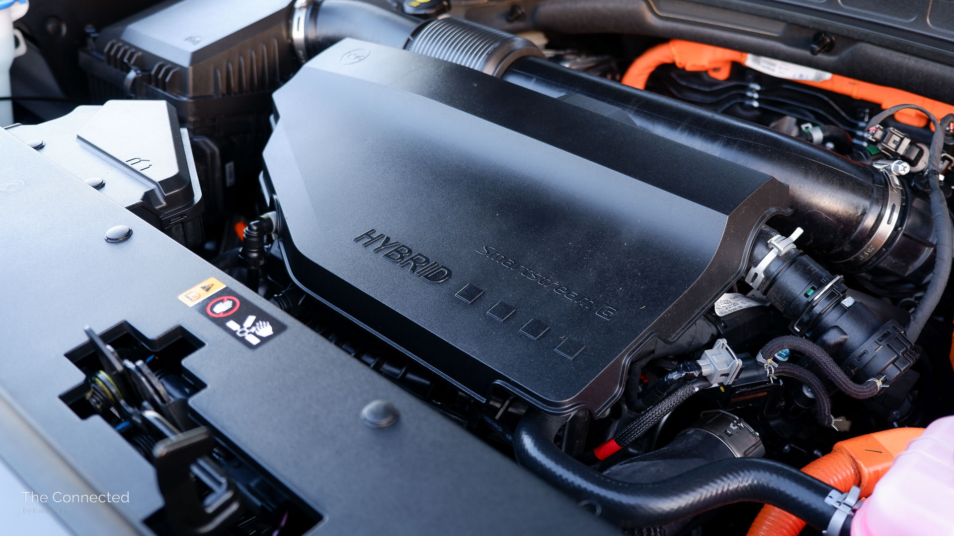 2026 Hyundai Palisade Calligraphy Hybrid engine with 'Hybrid' lettering and four pixel Hyundai dots