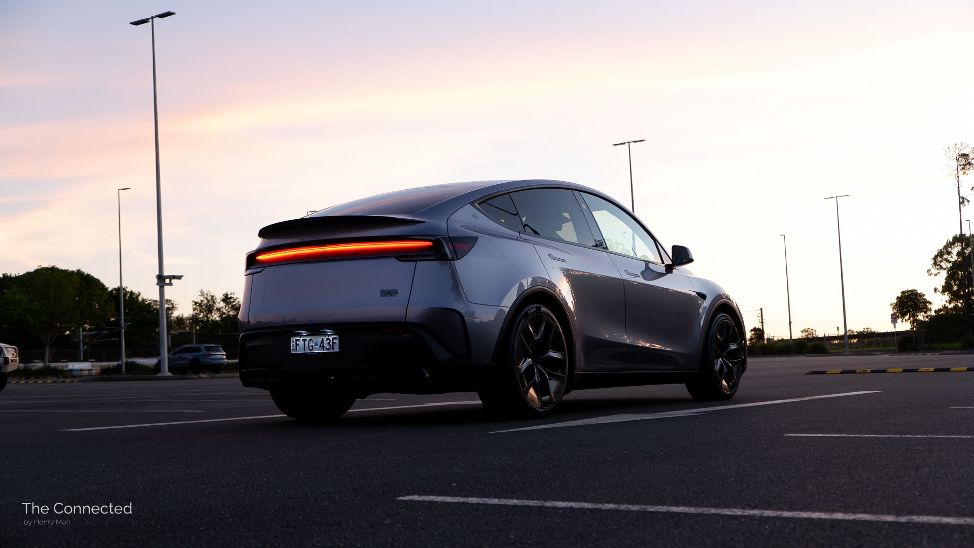 2026 Tesla Model Y Performance AWD rear in the sunset