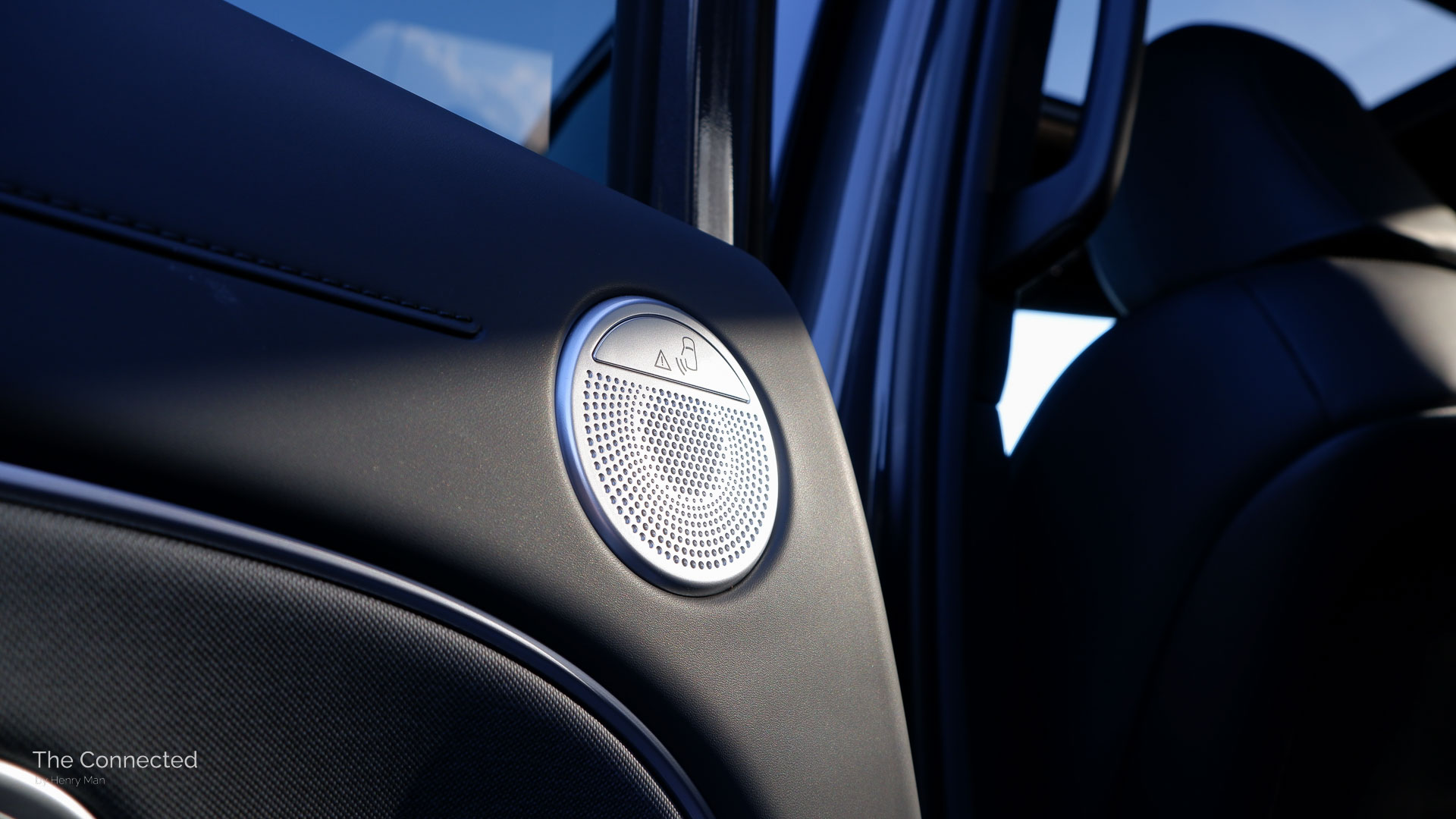 2026 Hyundai Palisade Calligraphy Hybrid rear door opening symbol above speaker