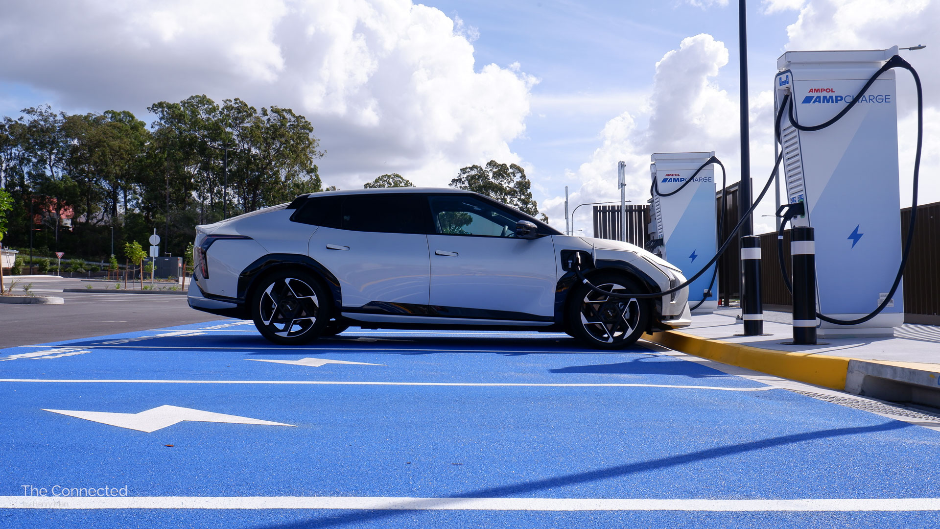 2026 Kia EV4 GT-Line plugged-in at public Ampol AmpCharge charging station