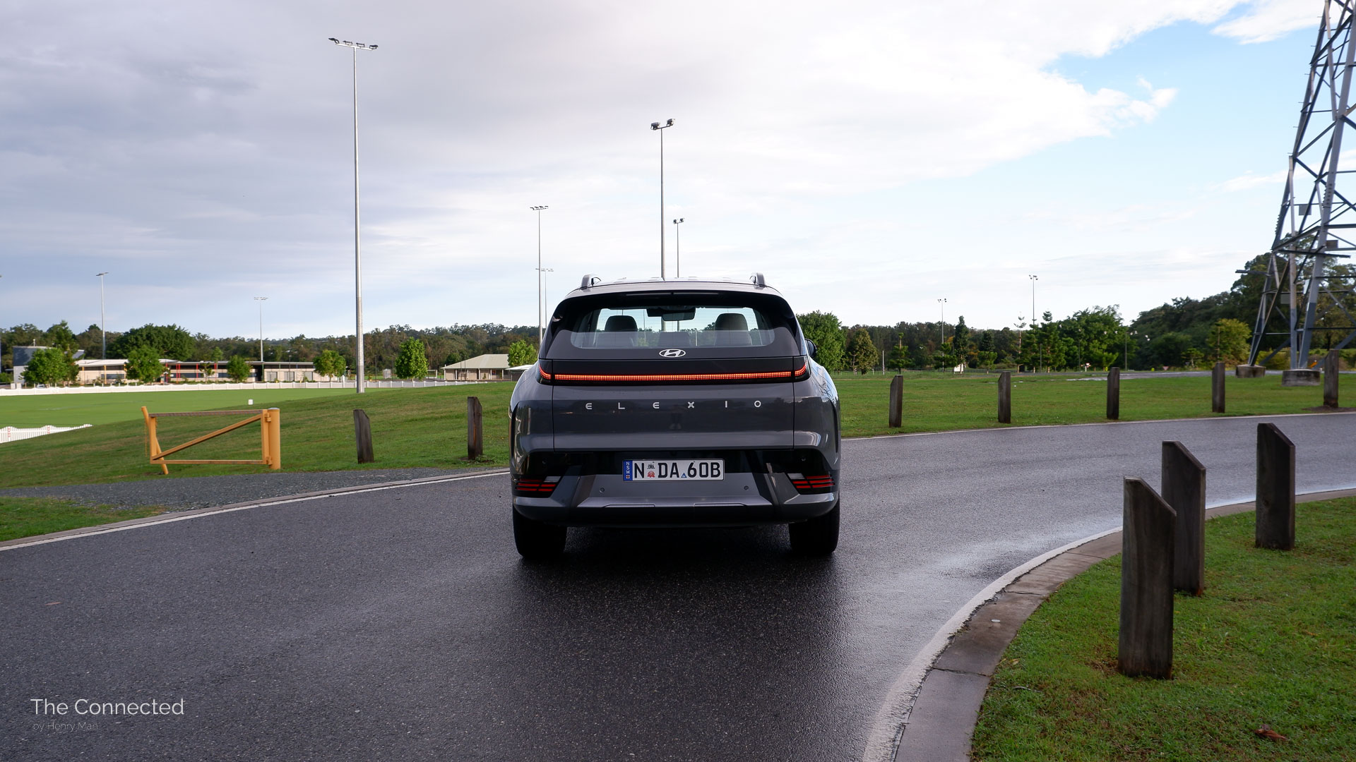 2026 Hyundai Elexio Elite rear view with a park and transmission tower behind
